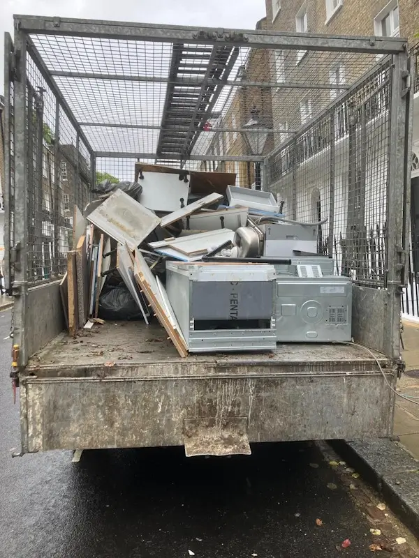 Rubbish Removal Kensington - Loading waste onto specialized collection truck