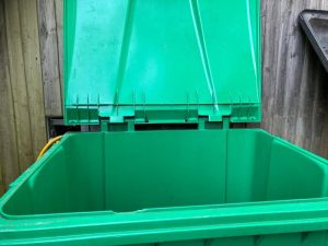 Empty cleaned commercial waste area after professional bin collection service completed in Dartford DA1