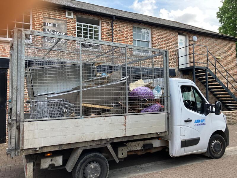 Professional rubbish removal truck loaded with mixed waste in Bexley DA5 - Junk Guy collection service