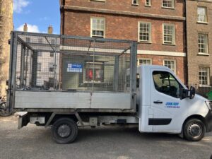 Junk Guy team loading builders waste for rubbish removal in City of London EC4 postcode area