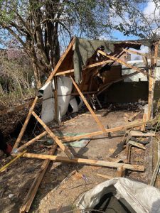 Garden clearance Bromley shed removal service showing dismantled wooden shed and debris clearance