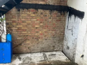 Completed shed removal showing clean cleared space in Islington N5 postcode area