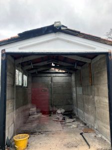 Garage demolition assessment by Junk Guy certified engineers evaluating structural requirements