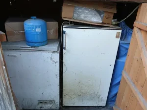 Islington shed filled with fridges and appliances requiring professional clearance service