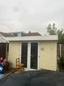 Shed removal in progress at Pitsea SS13 property showing professional dismantling service