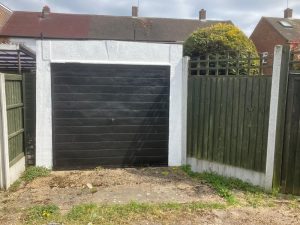 Single garage removal service showing complete demolition and site clearance