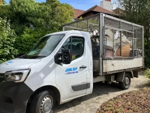 Professional Junk Guy rubbish removal truck in Kent residential area