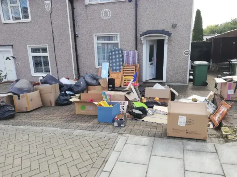 Loft clearance Bromley BR1 showing household items including boxes, mattress, furniture, toys and general waste removed from residential loft space