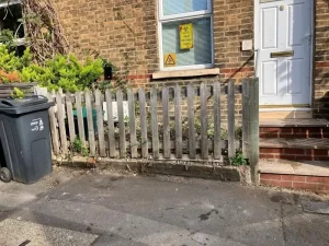 Clean residential property front area in Croydon after professional rubbish removal with proper waste bin placement
