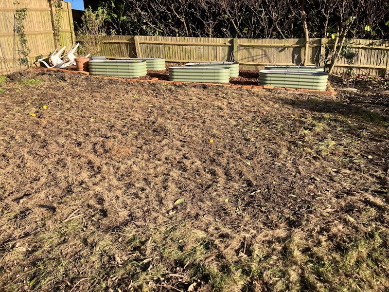 Large pile of green garden waste ready for collection and recycling in Pembury, Kent TN2