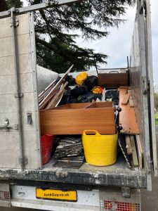Loaded rubbish removal truck during furniture disposal in Tonbridge Kent by Junk Guy®