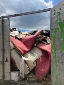 Mixed domestic waste bags and packaging waiting for clearance in Shooter's Hill