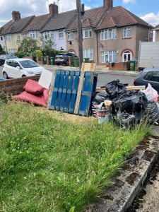 White kitchen appliance and household items for removal in Shooter's Hill SE18