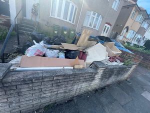 Front garden house clearance pile in Shooter's Hill SE18